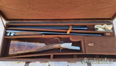 Doppietta Piotti side lock cal 20 con 2 paia di canne 70 3/1 e 60 3/4 completa di cassetta