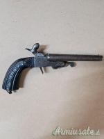 Pistola antica a due canne