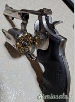 Fucile a pompa cal. 12 + smith & Wesson cal. 38sp.