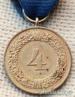 Medaglia tedesca d’epoca nazista concessa per “4 ANNI DI FEDELE SERVIZIO” nella KRIEGSMARINE