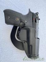 Fondina Blackhawk per Beretta 92/96/98 FS, cinturone, porta caricatori.
