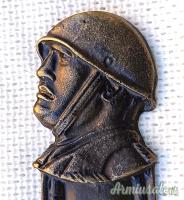 Tagliacarte d'epoca fascista con profilo elmato di “BENITO MUSSOLINI