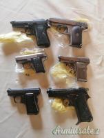VENDO COLLEZIONE DI VECCHIE PISTOLE BERETTA BROWNING BERNARDELLI ETC