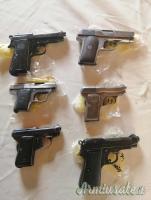 VENDO COLLEZIONE DI VECCHIE PISTOLE BERETTA BROWNING BERNARDELLI ETC