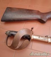 Carabina otturatore Savage  e Sciabola.