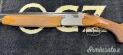 Cal. 20, Sovrapposto Marca Beretta, Mod. S57 Elegant, Canne da Cm. 71 3/1, Estrattori Automatici.