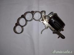 Pistola tirapugni