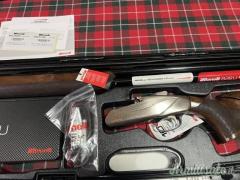 FUCILE BENELLI 828 SPORTING CON CANNE AI CAL.12
