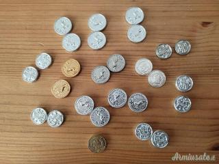 Lotto medaglioni per guancette pistola e revolver