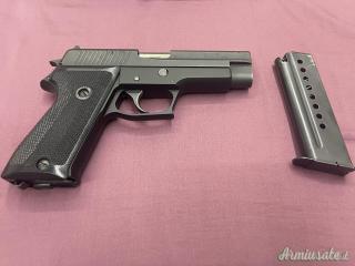 SIG-Sauer P220 9x23mm Steyr