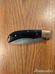 Coltello tascabile artigianale in acciaio Damasco e corno