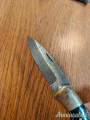 Coltello tascabile artigianale in acciaio Damasco e corno