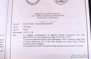 Medaglia d’appartenenza alla “OPERA NAZIONALE PROTEZIONE MATERNITÀ E INFANZIA” modello 1930
